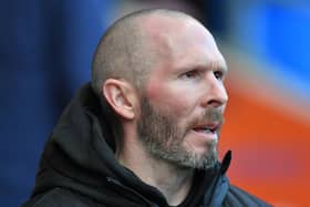 Michael Appleton's side are predicted to stay up by the skin of their teeth