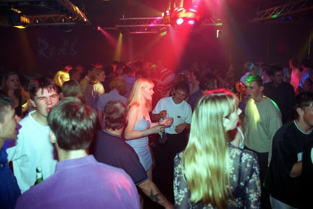 A packed dance floor at Harlequinns nightclub on Kemp Street in 1999