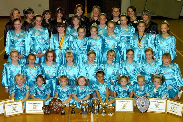 Blackpool Crusaders Morris Dancers showing off their many trophies