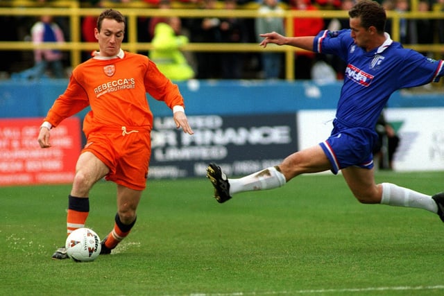 Micky Mellon on the ball in this match against Gilligham in 1997. The strip he's wearing spanned the seasons from 1995 - 1997