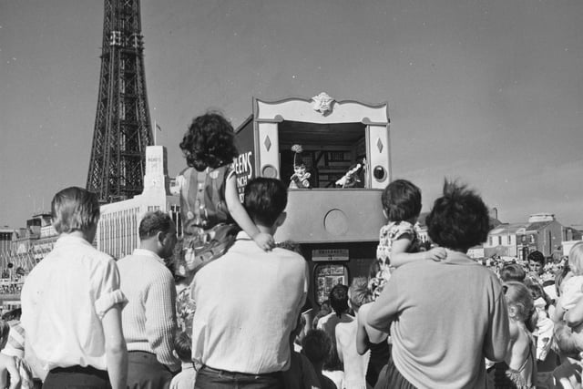 Holiday-makers watching a Punch and Judy show in 1960