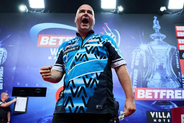 Rob Cross defeated Ryan Searle when they met in the Betfred World Matchplay at Blackpool's Winter Gardens Picture: Mark Robinson/PDC