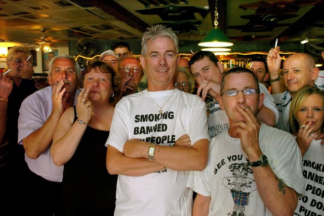 Hamish Howitt (centre) and happy smokers at the Happy Scots Bar, Rigby Road, Blackpool. This was when he planned to flout the smoking ban in his pub