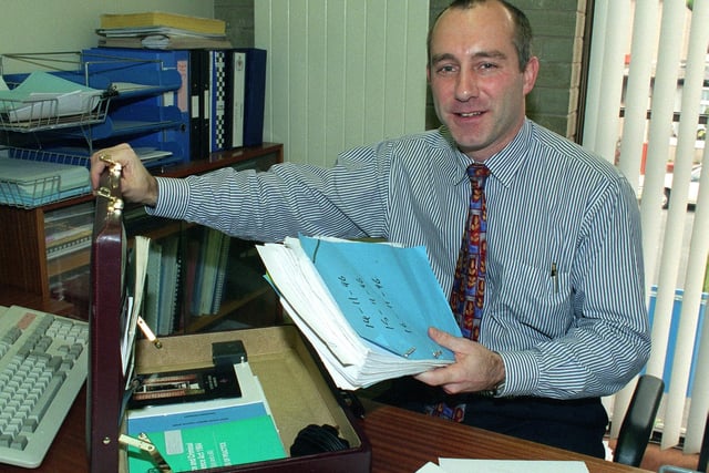 Detective Chief Inspector Mike Kellett, clearing his desk at Fleetwood Police Station, ready for his move to Blackpool in March 1997