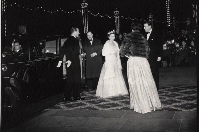 Queen Elizabeth II and the Duke of Edinburgh arrive at Blackpool Opera House for the Royal Variety Performance in 1955 to adorning crowds