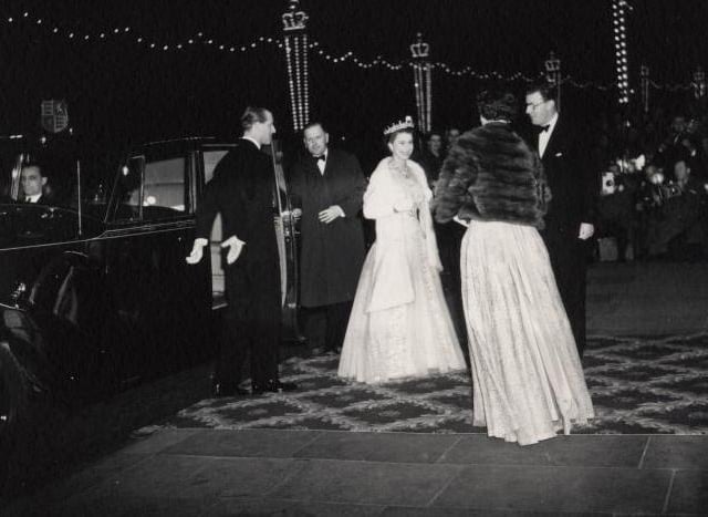 Queen Elizabeth II and the Duke of Edinburgh arrive at Blackpool Opera House for the Royal Variety Performance in 1955 to adorning crowds