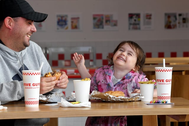 Two-year-old Sophie Burrow and her dad John were the first customers.
