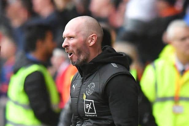 Michael Appleton roars his delight after CJ Hamilton put the game to bed