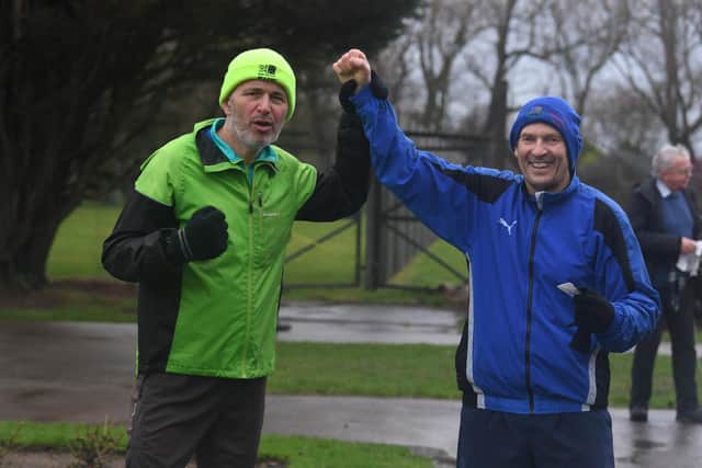 Brian Cumpsty and Jim Almond complete their 100 mile run in 24 hours at Blackpool Parkrun at Stanley Park. Picture: Neil Cross.