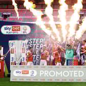 LONDON, ENGLAND - MAY 30: Chris Maxwell of Blackpool lifts the Sky Bet League One Play-off Trophy as his team mates celebrate following victory in the Sky Bet League One Play-off Final match between Blackpool and Lincoln City at Wembley Stadium on May 30, 2021 in London, England. (Photo by Catherine Ivill/Getty Images)