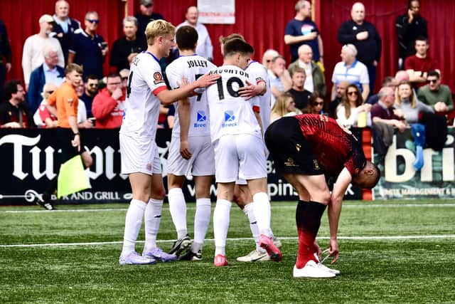 Nick Haughton is congratulated after his goal (photo: Steve Mclellan/AFC Fylde)