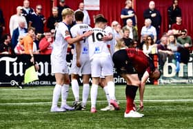 Nick Haughton is congratulated after his goal (photo: Steve Mclellan/AFC Fylde)