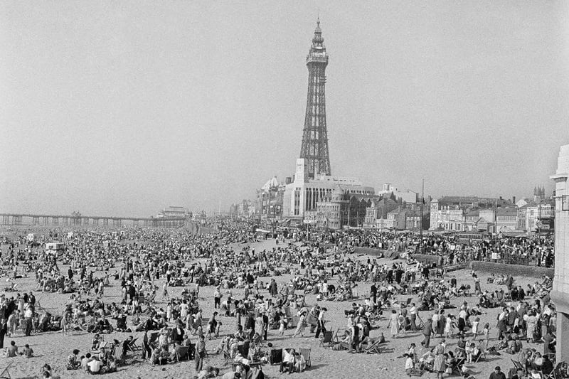 This picture formed part of a Grundy Art Gallery Exhibition of photos from the English Heritage National Monuments Records. The crowded beach scene was from the 1950s. Picture credit: Photo: John Gay/Historic England/Mary Evans
