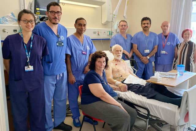 The Structural Intervention Team at Blackpool Victoria Hospital with patient Roger Leeson and wife Irene