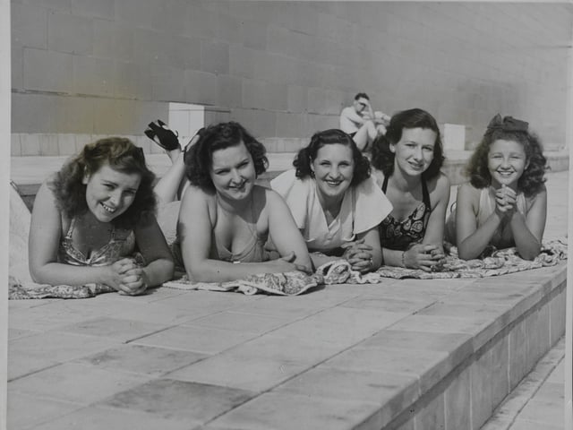 "The nice hot summers and sunbathing on the roof terrace at Derby baths with friends" - Elaine Butterworth. This is an early photo of sunbathers using the terrace