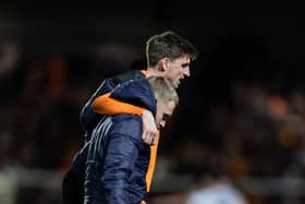 Jake Beesley limps off injured (Photographer Andrew Kearns / CameraSport)