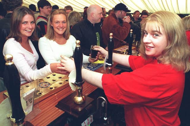 Customers enjoy a Beer Festival the Saddle Inn