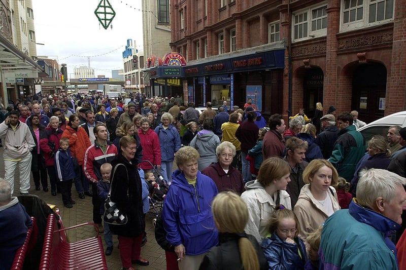 Queuing up outside the Show Shop and Blackpool Tower on Bank Hey Street during half term in 2000