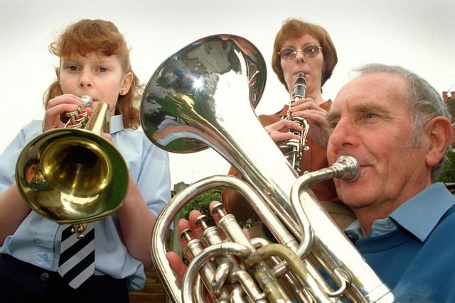 Three generations of the Norris family play in the Stanah Primary School band in Thornton. Pic L-R: Rebecca Norris (9), who plays both trumpet and piano, mum Linsey Norris on clarinet, and grandad Tom Derbyshire who plays baritone horn