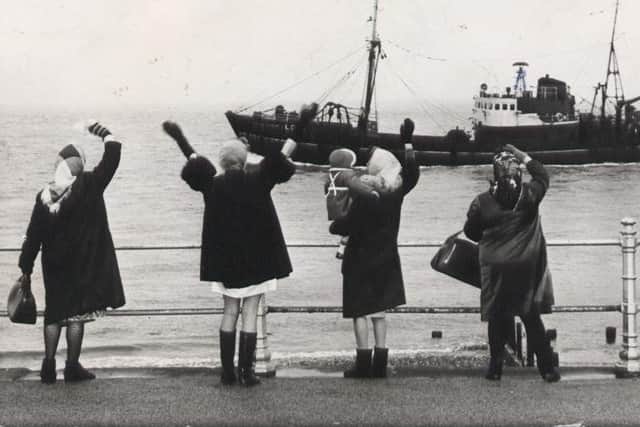 The poignant sight of Fleetwood women waving off their husbands trawlers inspired the Welcome Home statue on the town’s seafront. The photograph dates from the 1960s and was lent to us by Fleetwood man John Noble Photo: Submitted