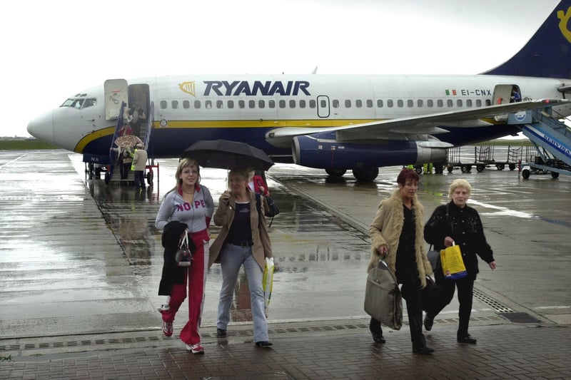 Passengers arrive at Blackpool Airport from Dublin on the Ryanair flight, 2003