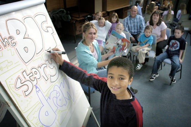 Jordan Slater and one of the groups at the The Big Draw event at Blackpool Central Library