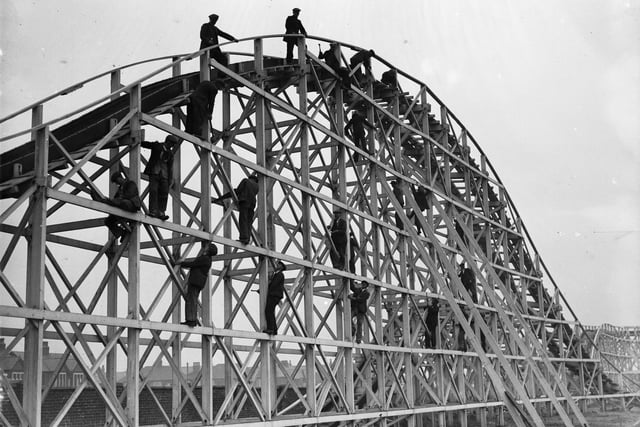 Men at work on the girders of a new switchback at Blackpool Pleasure Beach ready for Easter
