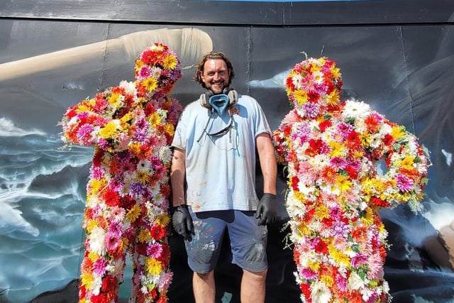 Christian Fenn and the flower pot men. Photo by Andy Beech