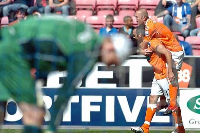 Gary Taylor-Fletcher celebrates with Stephen Crainey after giving Blackpool the lead