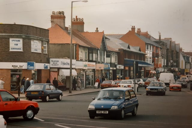 The caption on the back of this photo from 1992 says: "Bustling with activity, Cleveleys is a popular shopping centre - not surprisingly when the wide range of shops, from supermarket to specialist, is taken into consideration