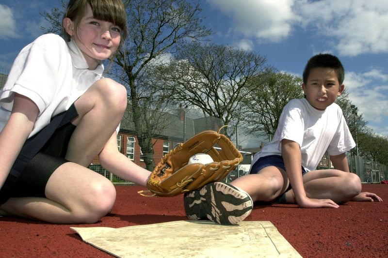 Youngsters at Revoe School in Blackpool enjoyed a taste of America in PE when a baseball coaching team visited in 2001. 11 year-olds Abby McLaughlan and Jimmy Clements recreate some base action