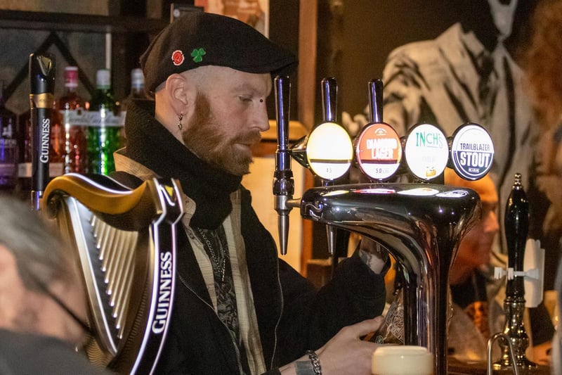 Shickers Tavern boss Liam Johnston pulls a pint during the grand launch