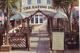 The Eating Inn on South Promenade is an intimate family-run restaurant which has a glowing reputation for serving some of the best steaks around, but with many other options on the menu. It's family-run and traditional, with wooden beams, and modern with plush carpet and chrome light fittings and offers tables in its conservatory orinner restaurant area. It was originally built as a fisherman's cottage and acquired in 1980 by Michael Shorrock, who later passed it to his son Ben.