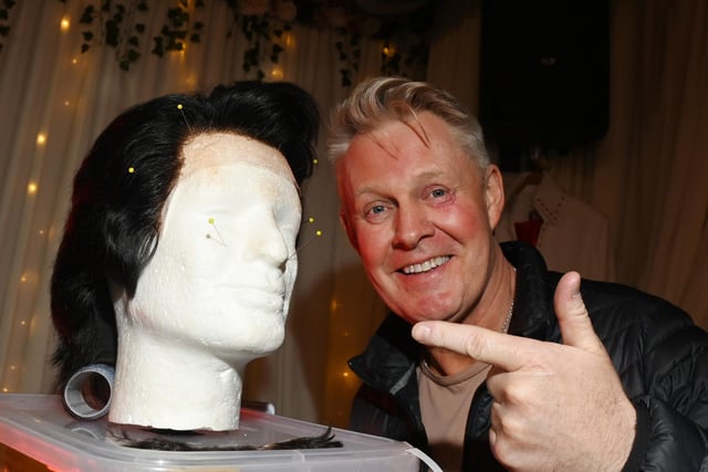 Elvis tribute contestant Paul Larcombe before his transformation to Elvis, pictured with his Elvis wig.