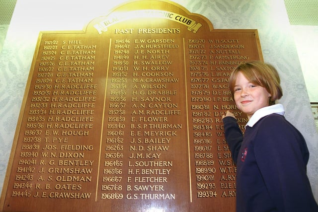 Pupils at St. John's Primary School in Blackpool were being taught in the nearby Masonic Hall during renovations at school, 1999. Sarah Horrocks who was ten, checking for her grandfather's name on the role of Honour of Past Presidents.