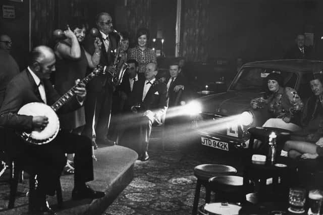 Power cuts in 1972 were the result of the miners strike. But they didn't stop Blackpool in its tracks. This superb photo shows Les and his Honky Tonks performing at the Royal Oak Hotel, South Shore. The headlights of a Mini belonging to one of the regulars provided emergency lighting during the blackout in the pub