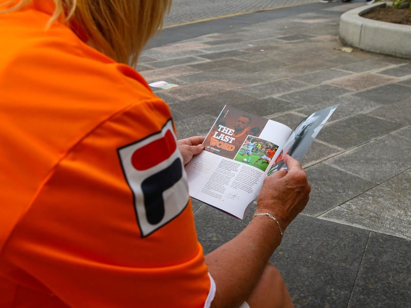 Football fans still enjoy collecting and reading match day programmes.