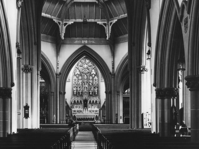 Inside Sacred heart RC Church, Talbot Road, 1958. Caption reads 'Many times the pews have been filled to overflowing on Sunday mornings