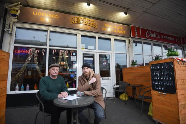 Sean Johnston and son Liam Johnston at their outdoor seating area at Shickers Micropub