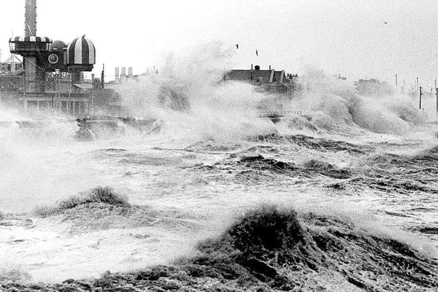 This image shows Morecambe being exposed to the waves and severe weather in 1977