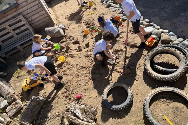 Westcliff pupils enjoying the beach area during OPAL play!