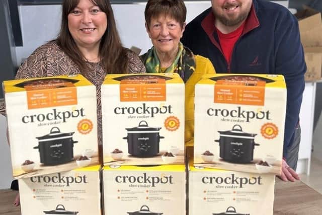 Co-op Funeralcare on Bispham Road has donated 30 Crock-Pots to the Layton Forward Project