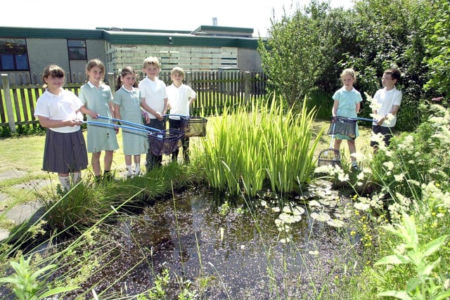 Year 3 pupils pictured at Breck County Primary School pond. From left, Stephanie Maylor, Fern Wild, Becky Green, Daniel Culley, Lee Hartley, Ella Currie and Ryan Wilson