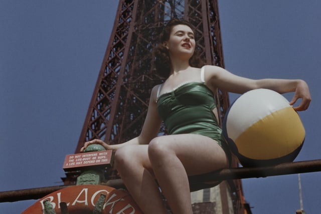 A young woman with a beach ball in front of Blackpool Tower, June 1955
