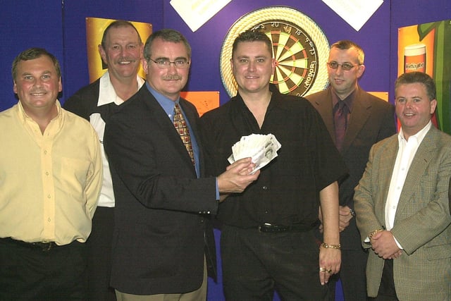 Bob Anderson Darts Classic at Thornton Sports and Social Club, sponsored by Coors Brewery. From left, Chris Vaughan (Club joint owner), Bob Anderson, Steve Donovan (Regional Director-Coors Brewery), Kevin Painter from Cambridgeshire (Winner of the £1500 prize), Rick Williams (Account Manager, Blackpool and Preston-Coors Brewery) and Alan Murray ( Club joint owner)