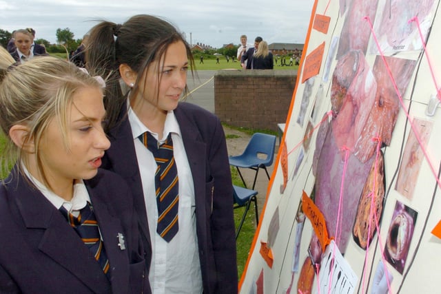 Palatine High School held a smoking awareness week. Pupils Katie Morris (14) and Natalie Jalil (14) looking at a display board showing images of unhealthy lungs