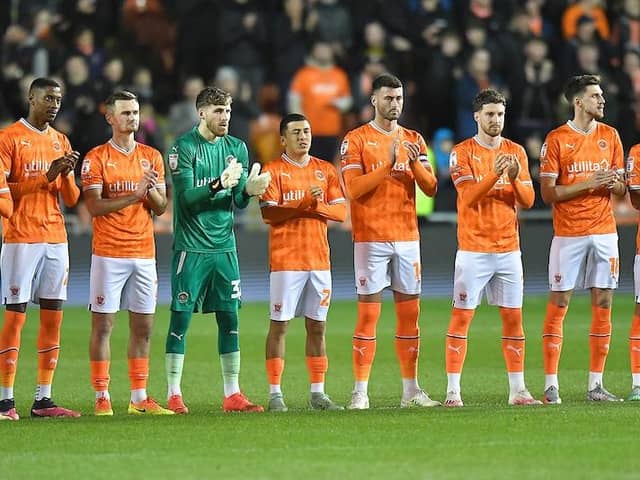 Both sides took part in a minute's applause prior to kick-off