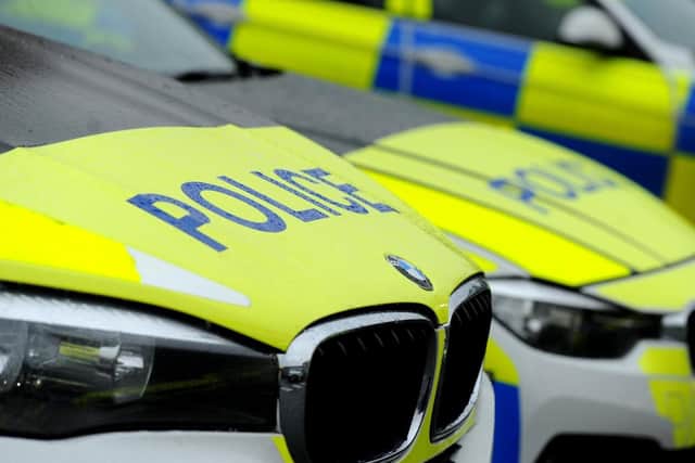 A man has been arrested on suspicion of interfering with motor vehicles and burglary and is currently in police custody