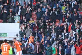 Blackpool fans in their final home match of the season against Barnsley. (Image: CameraSport)