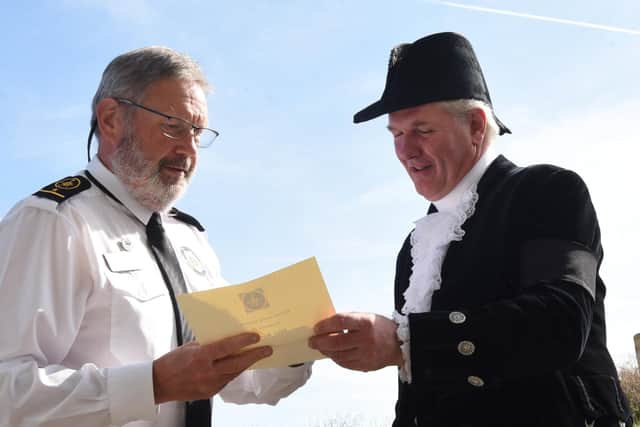 FLEETWOOD - 13-09-22 The High Sheriff of Lancashire Martin Ainscough takes a look aroud Rossall Point Watch Tower and learns about the National Coastwatch Institution before presenting certificates for service awards to volunteers.